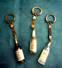 Vintage tiny Canadian Club whiskey bottle keychain picture
