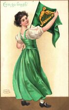 Irish Lass in Green Holds Flag Erin Go Bragh Vintage St. Patrick's Day Postcard picture