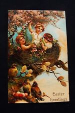 PFB Girls In Big Tree Nest Birds By Small Nest of Color Easter Eggs Postcard picture