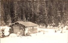 Vintage RPPC Postcard Two Men Stand Outside Trappers Cabin c.1907-1914     12301 picture
