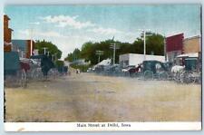 1911 Main Street Horse Carriage Town Dirt Road Establishment Delhi Iowa Postcard picture