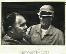 1993 Press Photo cap Pourceau, 81-year-old barber, cuts customer's hair. picture