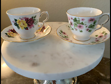 TWO QUEEN ANNE BONE CHINA FLORAL TEACUPS & SAUCERS ENGLAND.  picture
