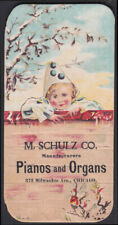 M Schulz Pianos & Organs Chicago folding trade card 1880s girl clown picture