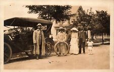 ANTIQUE REAL PHOTO RPPC POSTCARD: NICELY DRESSED FAMILY CHANGING CAR / AUTO TIRE picture