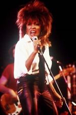 Tina Turner in white shirt and black leather pants on stage 12x18 poster picture