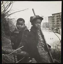 Photo:Two unidentified African American boys holding sticks picture