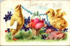 Antique EASTER Postcard  TWO CHICKS  BASKET w/COLORED EGGS  GREEN RIBBON   1907 picture