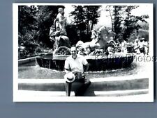 FOUND B&W PHOTO N_1883 MAN SITTING ON WATER FOUNTAIN LEDGE picture