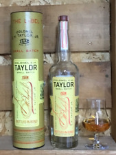 Empty E.H. Taylor Kentucky bourbon whiskey bottle and tube picture