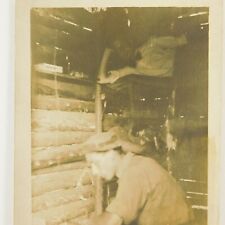 Vintage RPPC Postcard Three Men inside Log Cabin Bunks c.early 1900's Real Photo picture