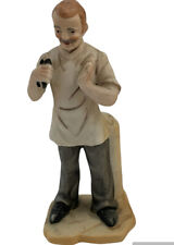 Vintage Figurine Dentist Holding Tooth Extraction Tool Ceramic picture