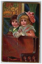 1907-15 Christmas Series Juvenile Postcard Embossed Vtg 2 Lovely Girls Wood Pews picture