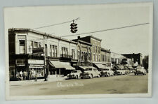 RPPC Downtown Street Scene Charlotte MI 1940s Cars Wildern Drug Store Stamp picture