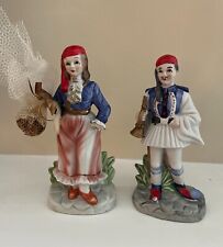 Two Vintage Porcelain Greek Figurines Trumpet Man and Garden Female picture