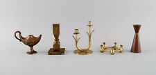 Quistgaard, Gusum, Ystad Metall et al. Oil lamp and four candlesticks in brass.  picture