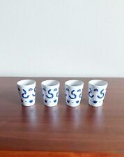 4 blue class style shot glasses, without the bottle picture