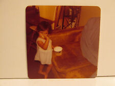 VINTAGE FOUND PHOTOGRAPH COLOR ART OLD PHOTO 1980 BRUNETTE TODDLER GIRL EATING picture