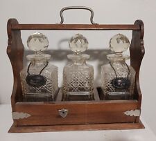 Antique English Cut Crystal 3 Decanter Tantalus Set with Oak Carriage  picture
