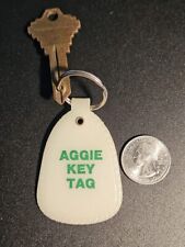 Funny Texas A&M vintage glow in the dark keychain with key attached backwards picture