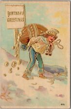 Vintage 1909 BIRTHDAY GREETINGS Embossed Postcard Boy with Big Bag of Coins picture