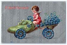 1911 Birthday Angel Riding Shoe Car With Pansies Flowers Des Moines IA Postcard picture