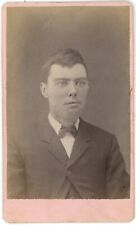CIRCA 1880'S ANTIQUE CDV OF ODD LOOKING YOUNG MAN IN SUIT AND BOW TIE picture