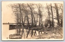 RPPC Man Fishing off a Pier w Canoe Behind Him Postcard RPP102 picture