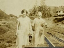 Two Women Walking On Railroad Train Tracks B&W Photograph 3.25 x 5.5 picture