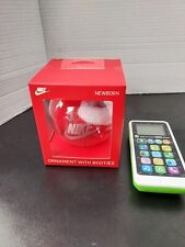 Nike Ornament With NewBorn Red Booties New In Package, & A Used Leap Frog Phone. picture
