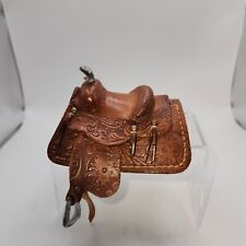 VINTAGE HANDCRAFTED  MINIATURE LEATHER TOOLED SADDLE - TOY, WESTERN DECOR picture