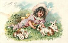 Embossed Tuck Easter Postcard 111 Little Girl Lies on Grass With 4 Rabbits picture