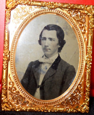 1/9th Size Tintype of young man in brass mat/frame picture