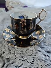 Vintage Elizabethan Tea Cup And Saucer. Black And Gold picture