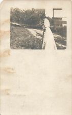 Postcard Grand Forks, North Dakota: Woman Taking Photo, RPPC, Dated 1909 picture