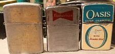 Lot Of 3 Vintage Continental Stormproof Lighters Oasis, Budweiser, And........  picture