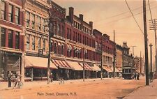 1910 NEW YORK POSTCARD: BAKERY, EYE DOCTOR ON MAIN STREET, ONEONTA, NY picture