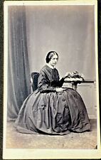 antique 1860s WOMAN in MOURNING CDV Civil War era Holding Photo Flowers picture