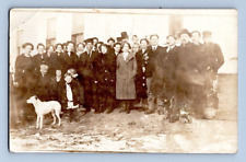 RPPC EARLY 1900'S. LARGE GROUP PHOTO POSING W/ WHITE DOG. POSTCARD ST4 picture