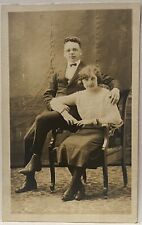 Studio Real Photo Postcard RPPC~Very Young Couple Sitting on One Chair picture