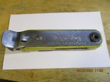 Tap Boy Bottle Opener Yellow.  Vaughan Chicago 24 USA. Vintage picture
