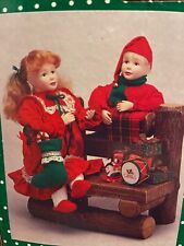 1993 Vintage Musical Animated Holiday Creations Christmas BOY and GIRL on bench picture