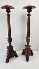 Pair of antique hand carved wooden candlestick holders used in church alter picture