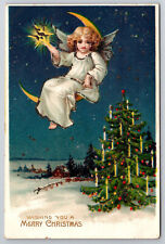 Vintage Antique C1910 Merry Christmas Angel On A Crescent Moon Postcard P152 picture
