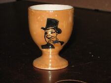 Vintage small cup with Charlie McCarthy  (or Mr. Peanut?) on side  2 1/4