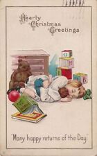 Postcard Hearty Christmas Greetings Little Girl Sleeping with Toys  picture
