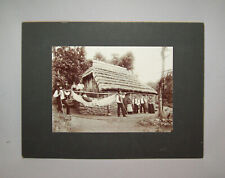 Antique Vtg C 1890s Mounted Photo 11X14 Man in Stretcher Thatched Roof Bare Feet picture