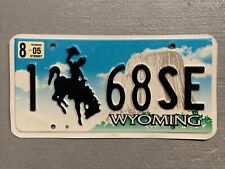 WYOMING LICENSE PLATE BUCKING BRONCO DEVILS TOWER EMBOSSED 1-68SE AUGUST 2005 picture