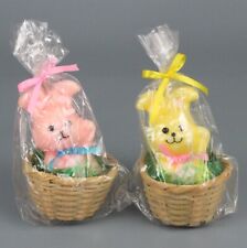 Easter Bunny Figural Candles lot of 2 Pink and Yellow 4 inch in basket Cello VTG picture