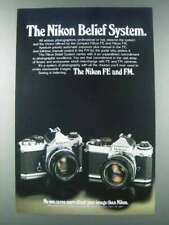 1981 Nikon FE and FM Cameras Ad - The Belief System picture